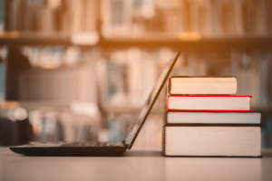 laptop and books