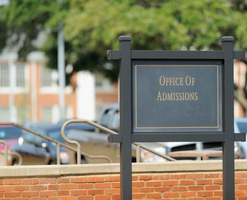 sign for the admissions office at a college