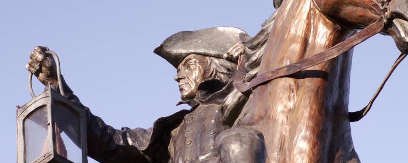 statue of Paul revere on his horse with a lantern