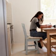 student writing a unique college essay