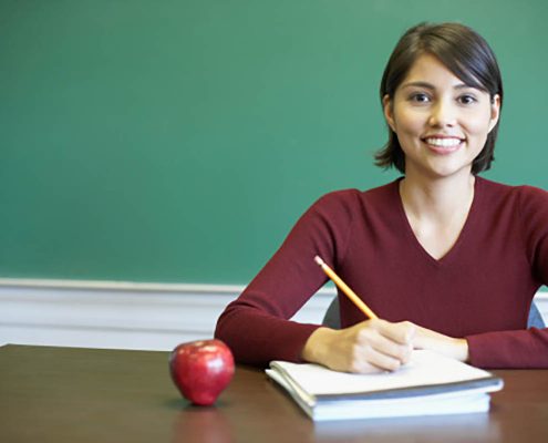 student working on a college essay