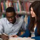 tutor helping a high school student with homework